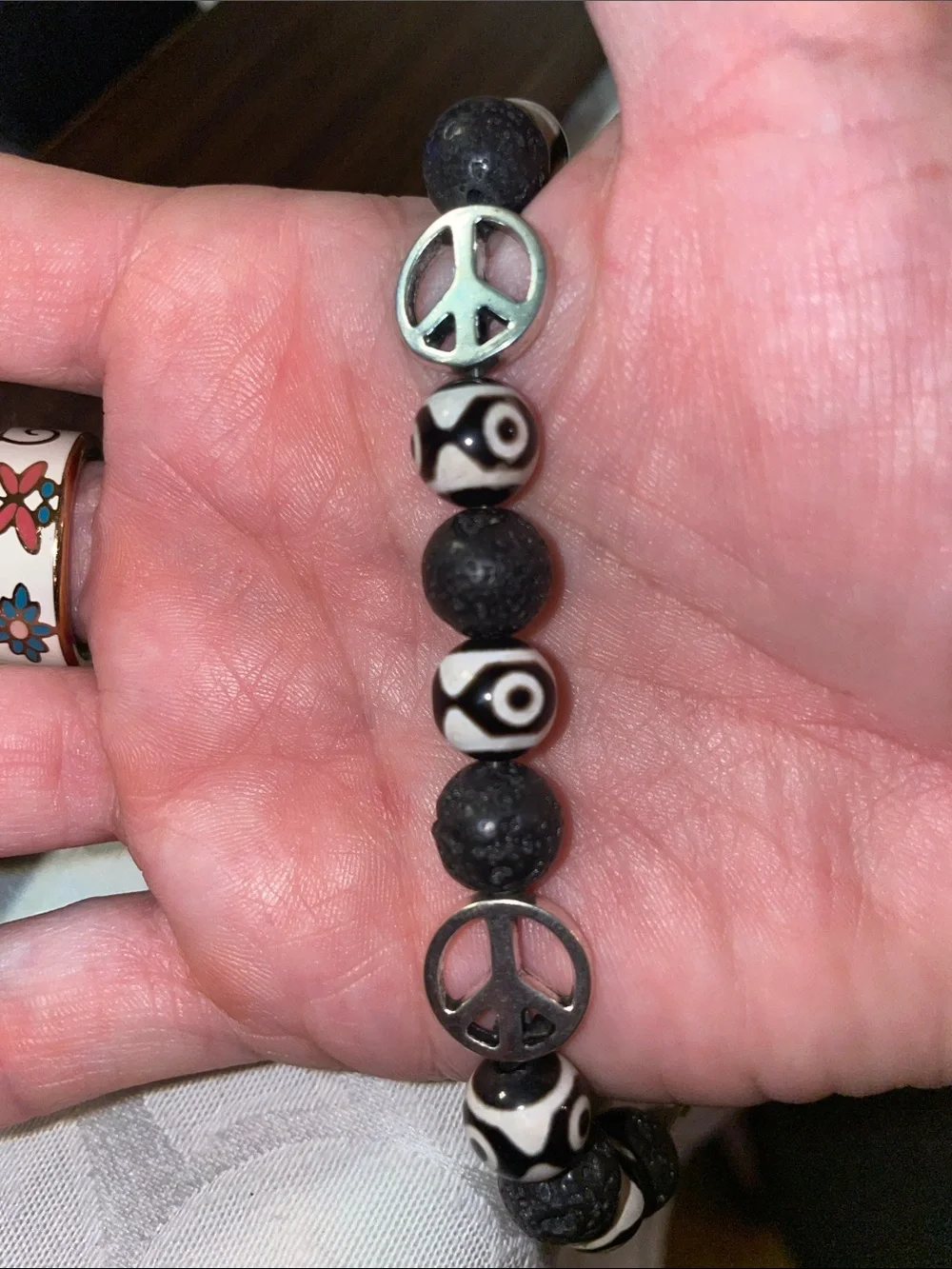 9-Bead Tibetan polish bead Anklet with lava beads and peace signs.